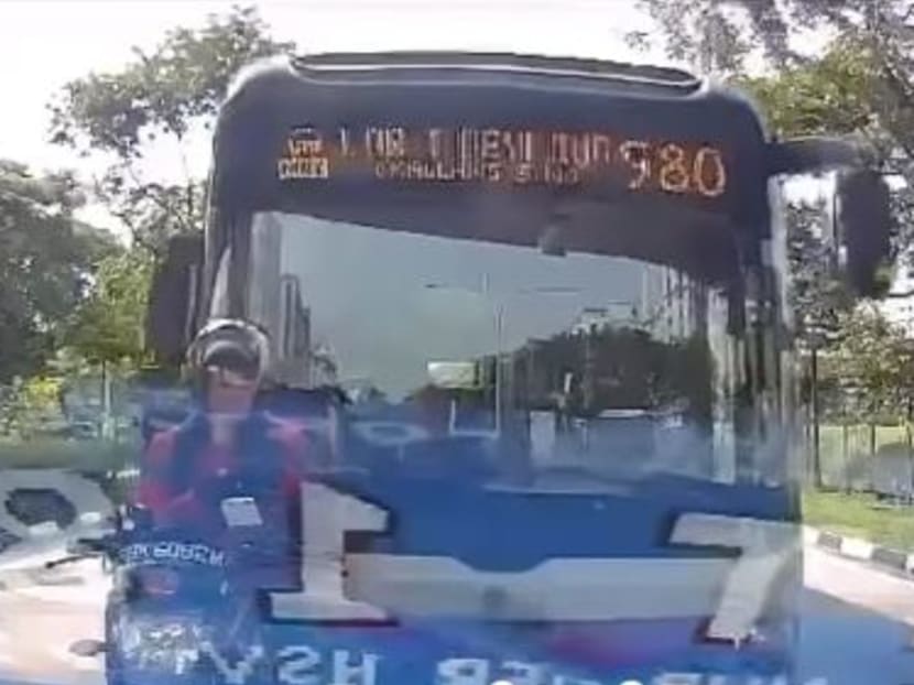 A screengrab of a video on Facebook group Sg Road Vigilante showed bus service 980 approaching a McDonald's delivery rider from the back before hitting him.