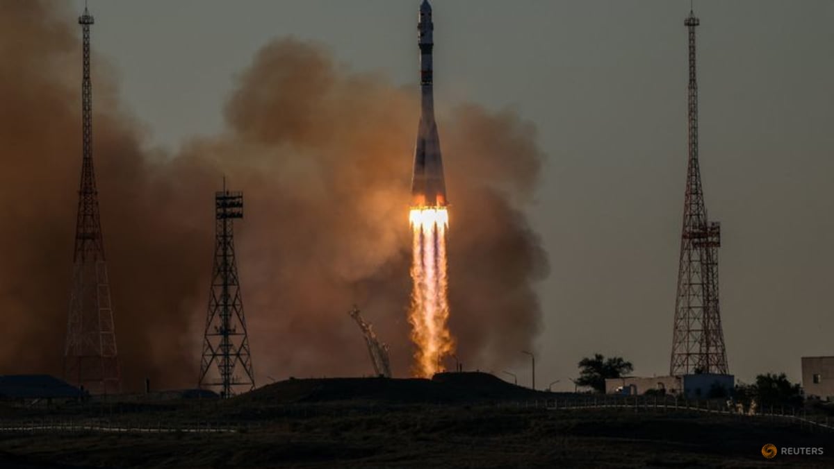 Russia launches American and two cosmonauts to space station with rare NASA chief visit