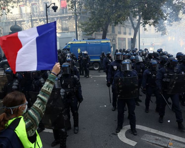 French authorities seek to ban or curb fresh protests