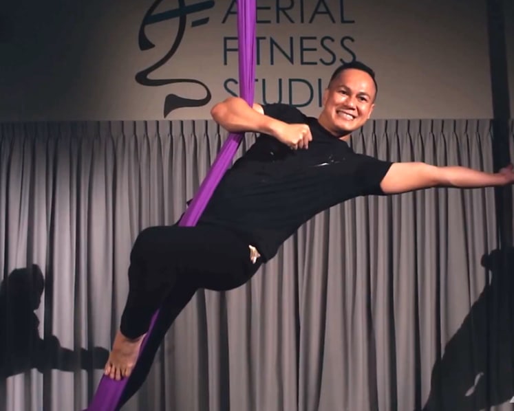 Engineer, innovator, aerial dancer: NUS scientist flies through the air on silk as a hobby