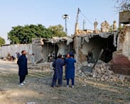 Bombing at mosque near police offices in Pakistan kills at least 21