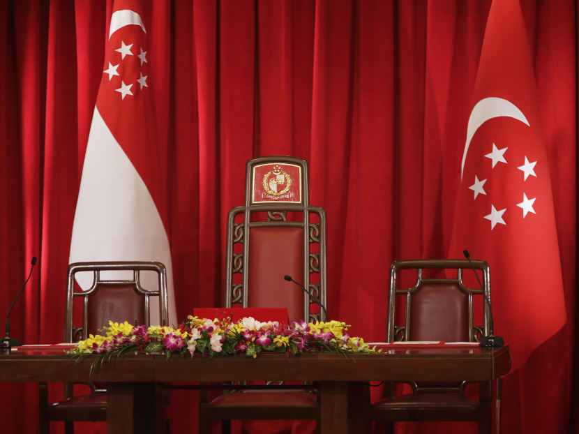 The Presidential Chair flanked by the State Flag and the Presidential Flag is seen at the Istana. TODAY file photo The Presidential Chair flanked by the State Flag and the Presidential Flag is seen at the Istana. TODAY file photo