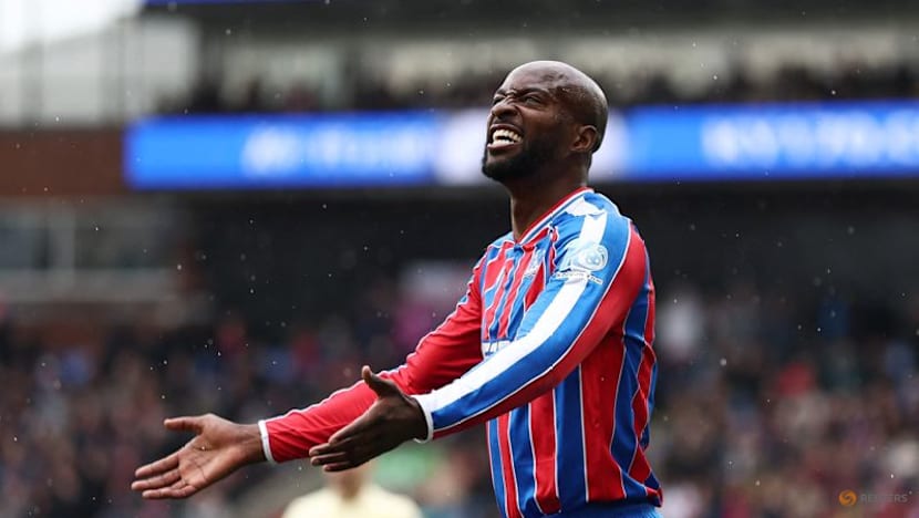 Arsenal survive huge scare to edge towards title