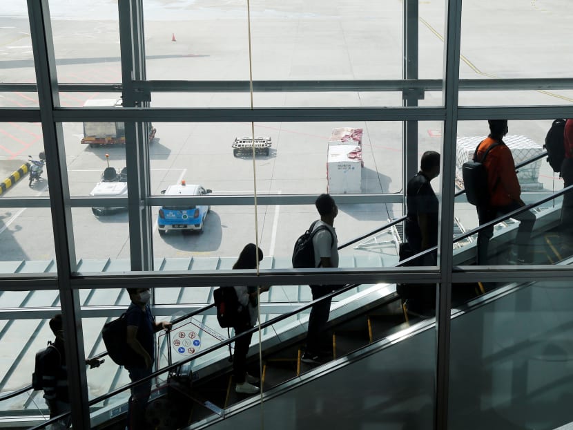 Travellers arrive at Kuala Lumpur International Airport (Klia) under the Malaysia-Singapore Vaccinated Travel Lane (VTL) programme, in Sepang, Malaysia on Nov 29, 2021. 
