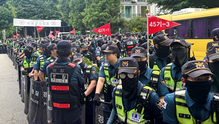 South Korean riot police clear protesters after ballot shortage blockade