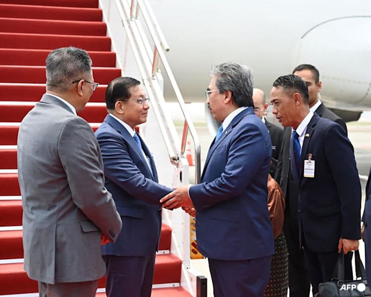 Myanmar leader lands in Malaysia for migrant return talks
