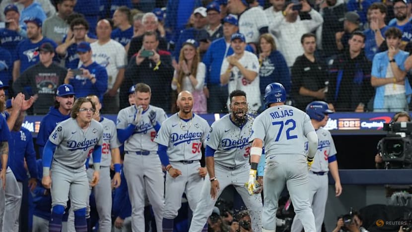 Baseball-Dodgers rally to beat Blue Jays, repeat as World Series champions