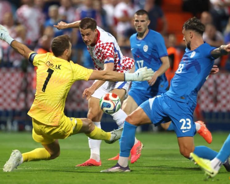 Croatia head to World Cup on high after late 2-1 win over Slovenia