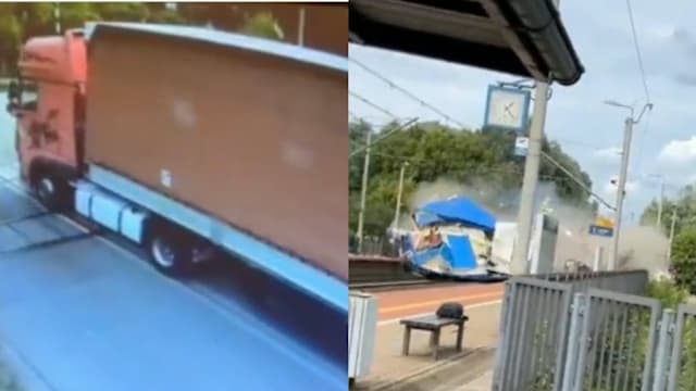 怕刮破篷布没撞开栏杆脱困 卡车遭火车猛烈撞击