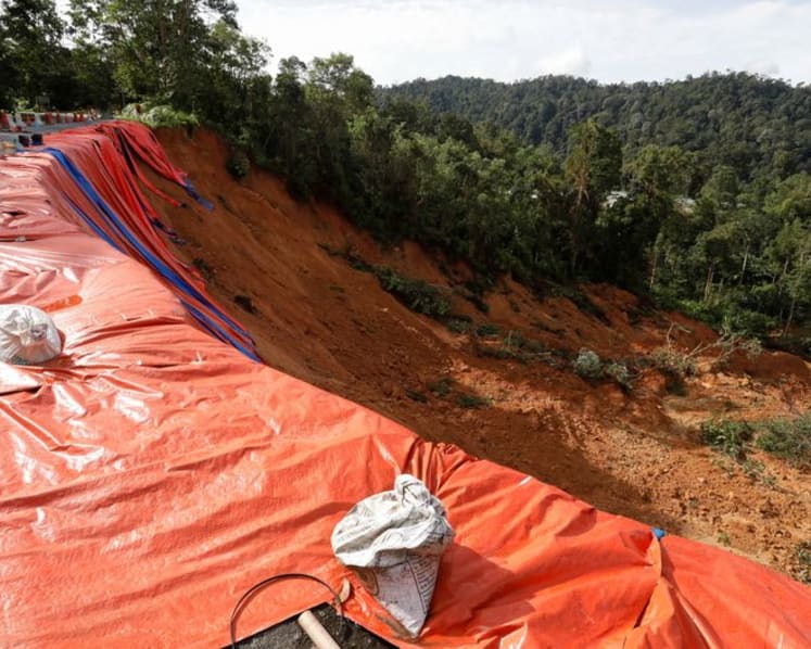 Malaysia landslide: Civil servant arrested for allegedly stealing items from victims