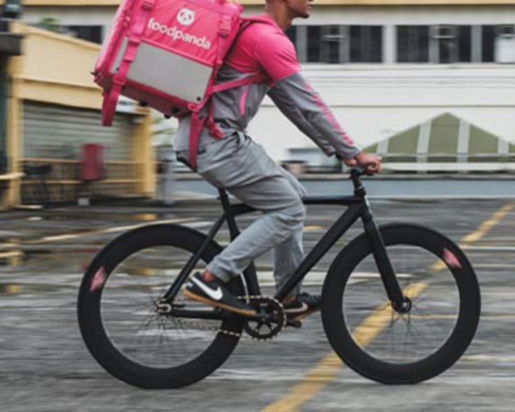 4 foreigners charged with working as food delivery riders without valid passes; 3 others face abetment charge