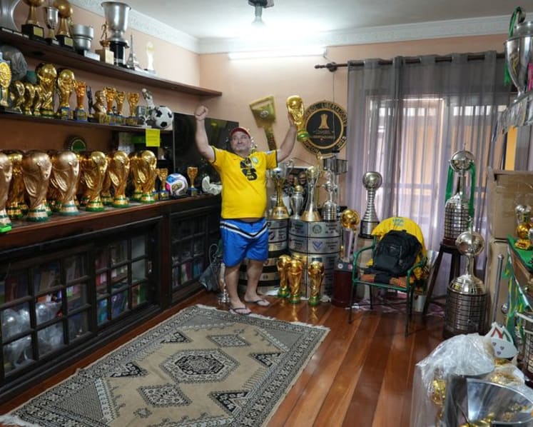 In Rio, artisan crafts World Cup trophies while hoping Brazil gets a real one