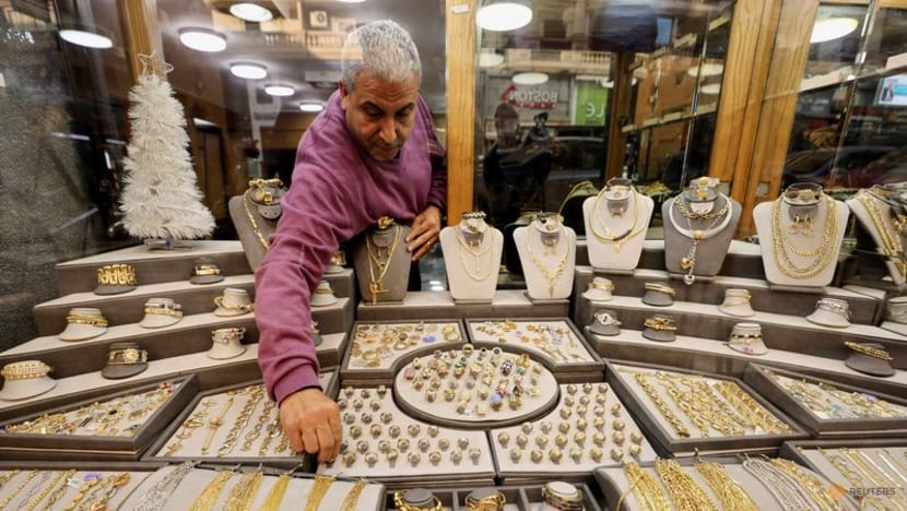 Gold soars to record high after Fed holds rates steady, signals two cuts in 2025