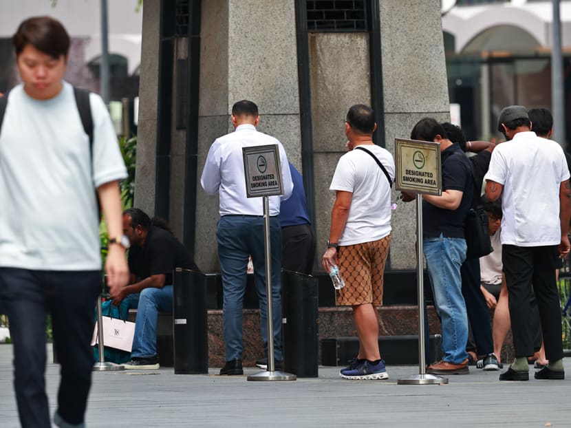 Smokers at a designated smoking point in Orchard Road on Sept 19, 2024. Smokers at a designated smoking point in Orchard Road on Sept 19, 2024.