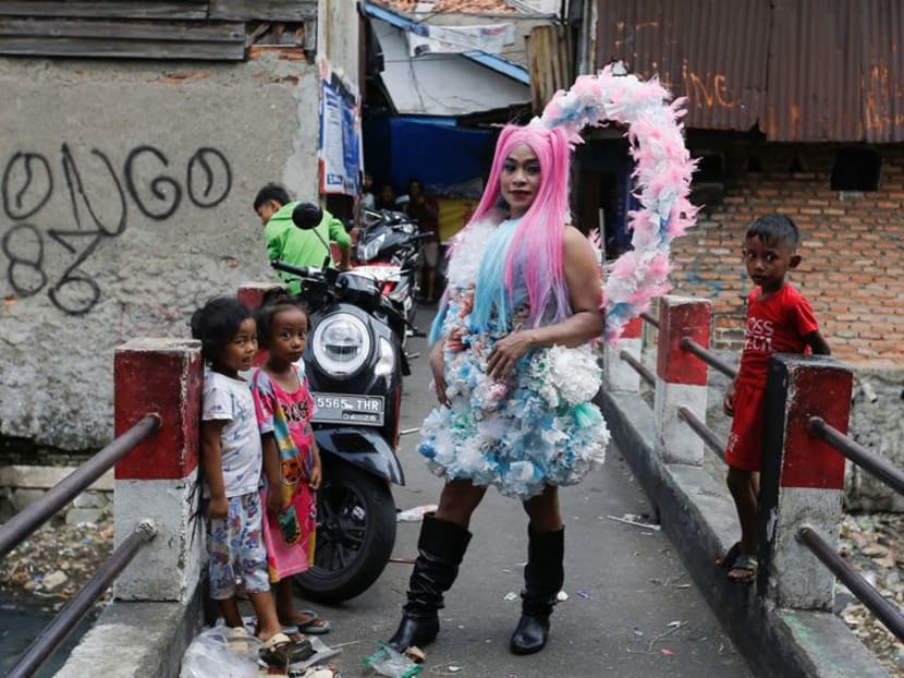 Indonesian transgender models shine spotlight on pollution with plastic fashion