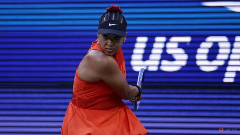 Resplendent in red, Osaka races into US Open second round
