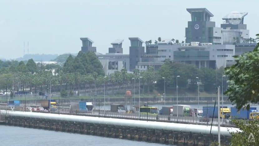 Driver accused of taking photos, videos at Woodlands Checkpoint to plead guilty, unaware it was 'so serious' 
