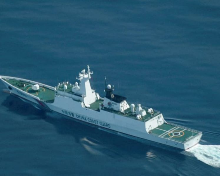 China holds National Day ceremony in waters off atoll claimed by Philippines