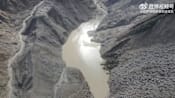 Lake overflows on Nepal-China border, sparking panic and halting rescue