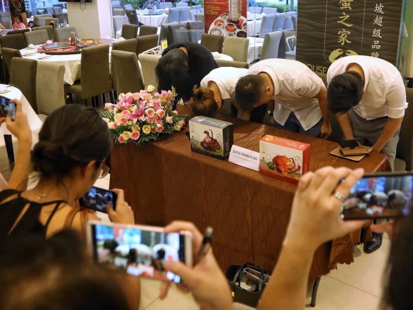 The House of Seafood management team at a press conference on Oct 25, 2019, apologising for putting live crabs in a claw machine. The House of Seafood management team at a press conference on Oct 25, 2019, apologising for putting live crabs in a claw machine.