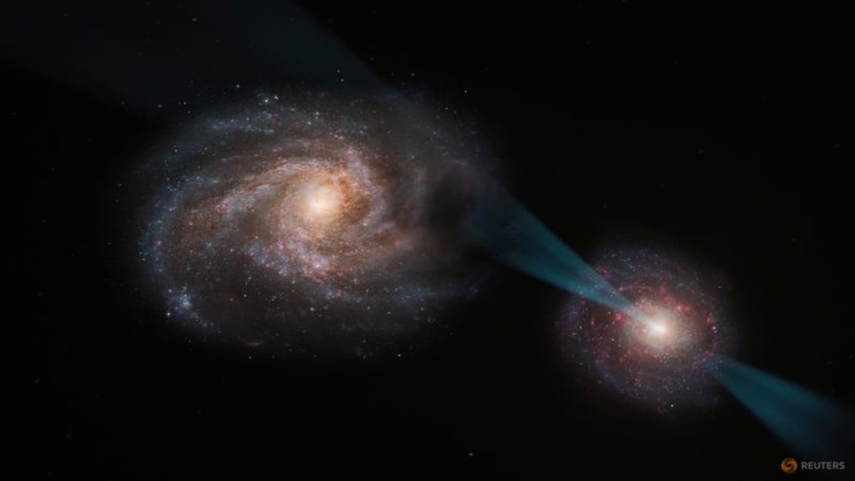 Two galaxies seen in a 'joust' preceding a cosmic mega-merger - Channel News Asia (Picture 1)