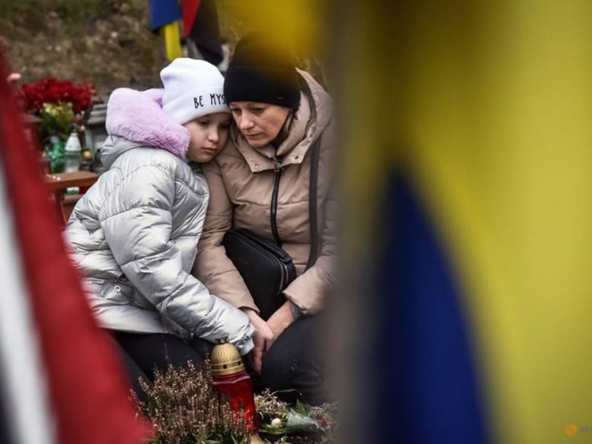 People visit graves of their relatives, killed Ukrainian defenders, on a day of the second anniversary of Russia's attack on Ukraine, in Lviv, Ukraine on Feb 24, 2024. People visit graves of their relatives, killed Ukrainian defenders, on a day of the second anniversary of Russia's attack on Ukraine, in Lviv, Ukraine on Feb 24, 2024.