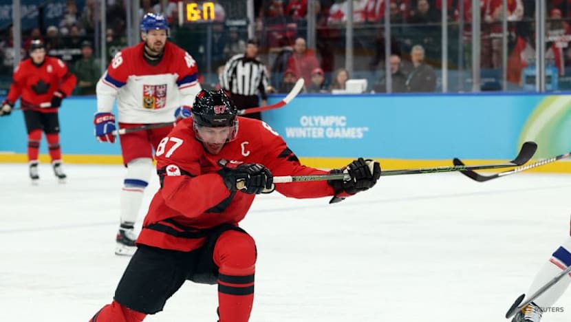 Ice hockey-'Go get it, boys': Injured Crosby's pep talk powers Canada quarter-final comeback
