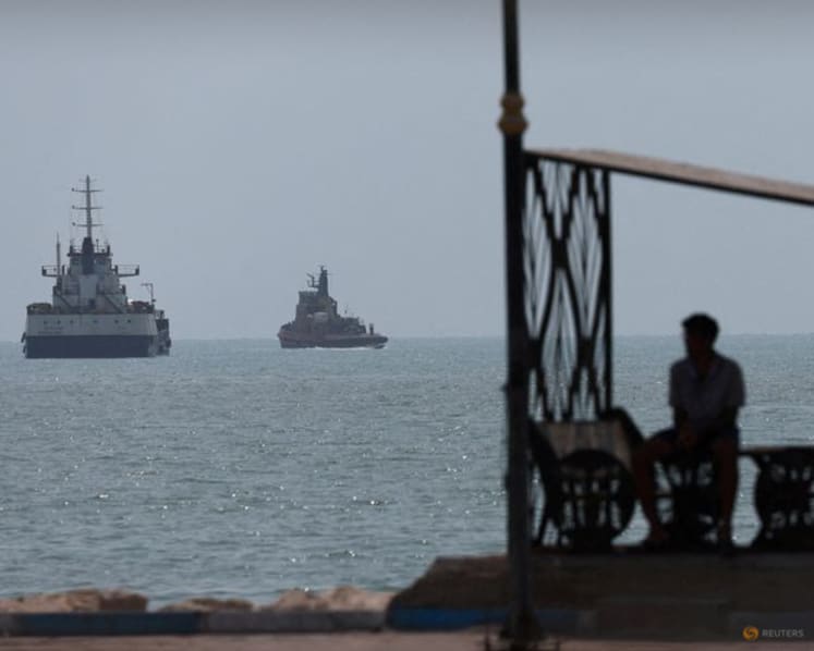 Iran urges US to comply with interim deal after Trump threatens further strikes
