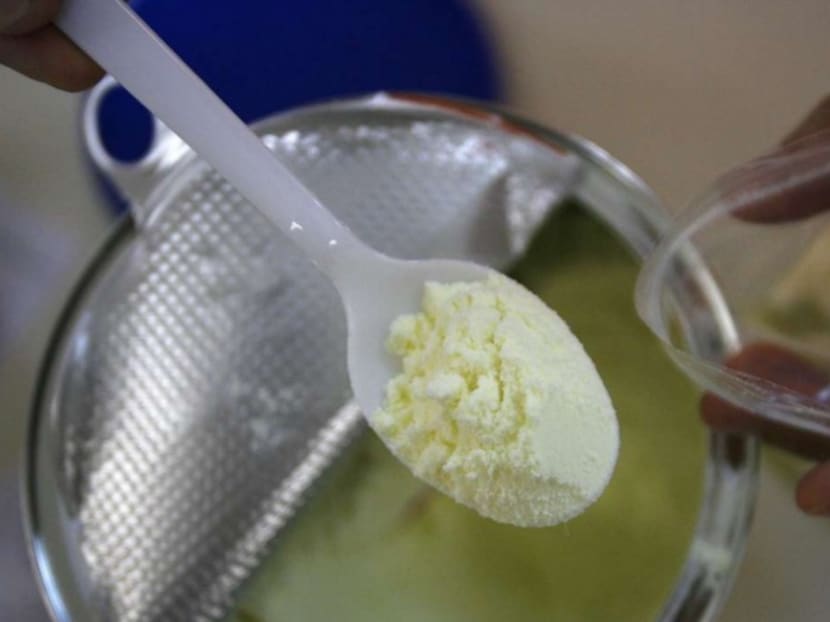 A file picture of a health official checking baby milk powder. Reuters file photo A file picture of a health official checking baby milk powder. Reuters file photo