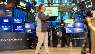 Wall St ends lower for the day and week as chip selloff broadens