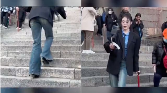 穿十公分高跟鞋 山东女子拄拐杖登泰山