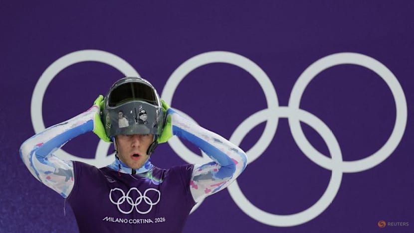 IOC 'begs' defiant Ukrainian to race without war dead helmet