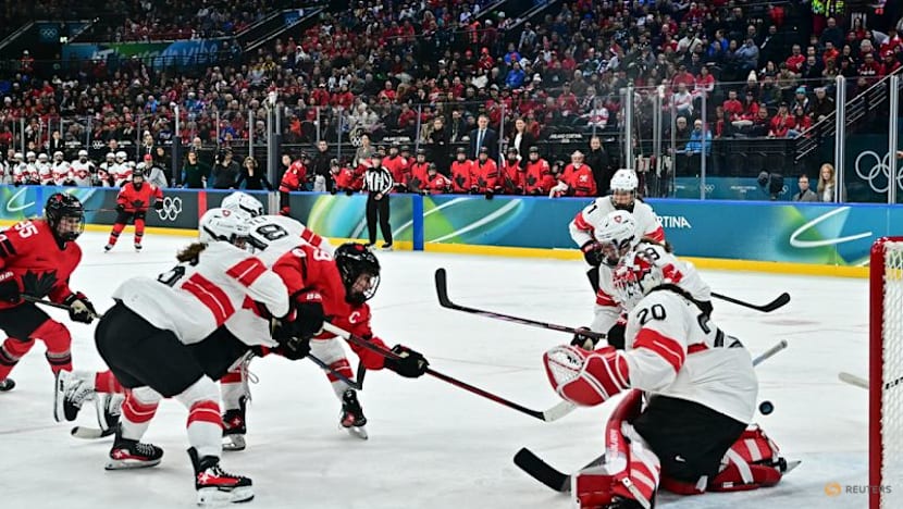 Ice hockey-Canada look to captain Poulin in title defence after goal-scoring record