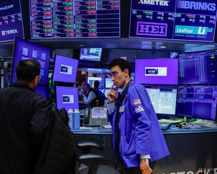 Stocks slip as dollar heads for weekly loss