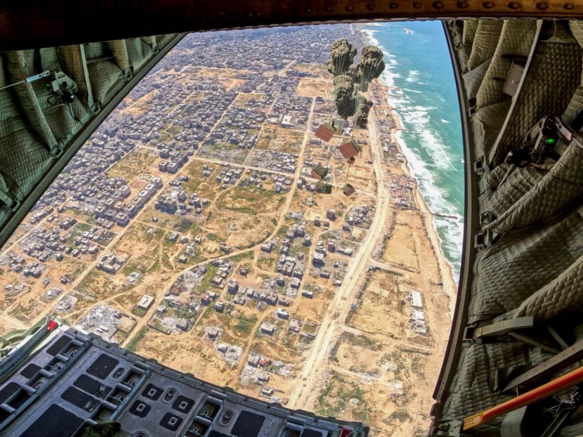 Crates of aid being airdropped into Gaza from the Republic of Singapore Air Force's C-130 transport aircraft on March 20, 2024. Crates of aid being airdropped into Gaza from the Republic of Singapore Air Force's C-130 transport aircraft on March 20, 2024.