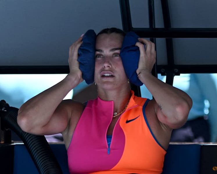 Organisers invoke extreme heat policy on hottest day at Australian Open