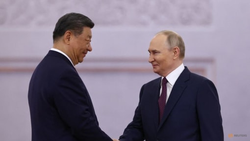 At Kremlin talks, Putin and Xi cast themselves as defenders of world order