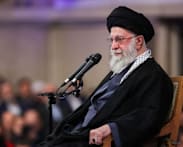 Iran's leaders struggle to end protests, US action in Venezuela stokes fears