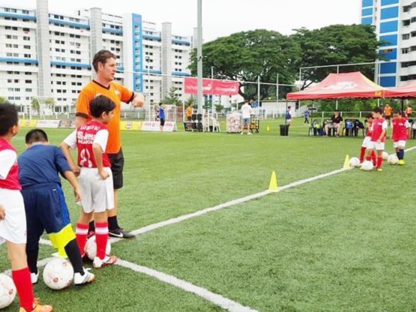 Children from JSSL Singapore football academy training at the HYFA facility at Mattar Road in 2015. Photo: HYFA/Facebook