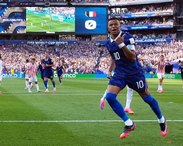 Mbappe keeps cool as France survive furnace against Paraguay