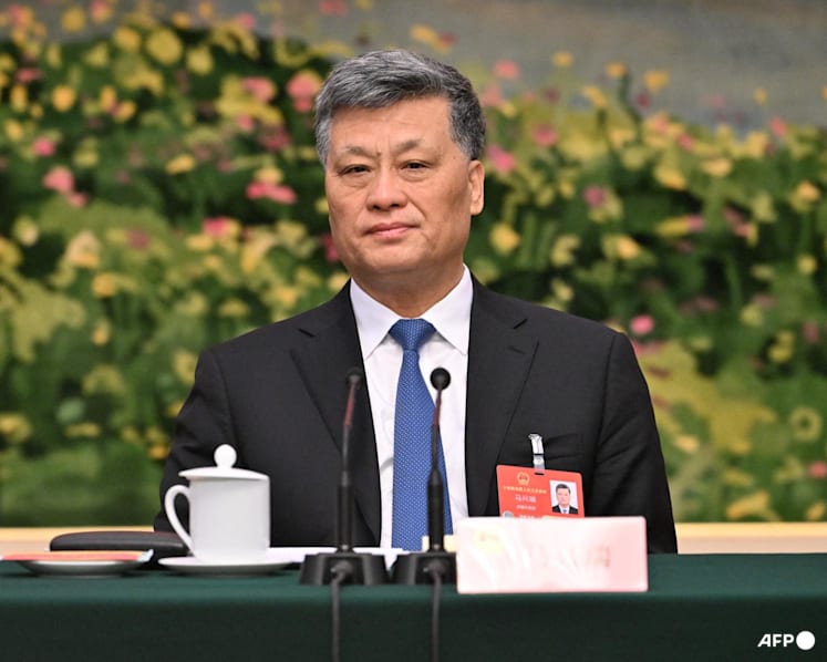 China strips generals, ex-financial regulator, politburo member of lawmaker posts