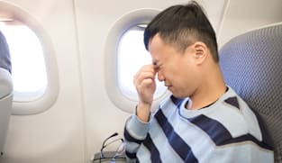 Cramped seats, bumpy rides: How to make your flights more bearable if you hate flying
