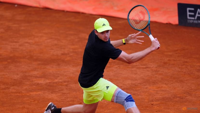 Djokovic-mentored Mensik overcomes crowd hostility for French Open win