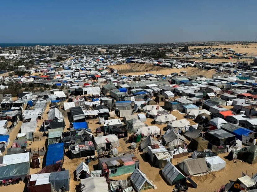 Displaced Palestinians, who fled their houses due to Israeli strikes, shelter in a tent camp, amid the ongoing conflict between Israel and the Palestinian Islamist group Hamas, in Rafah, in the southern Gaza Strip on March 11, 2024.