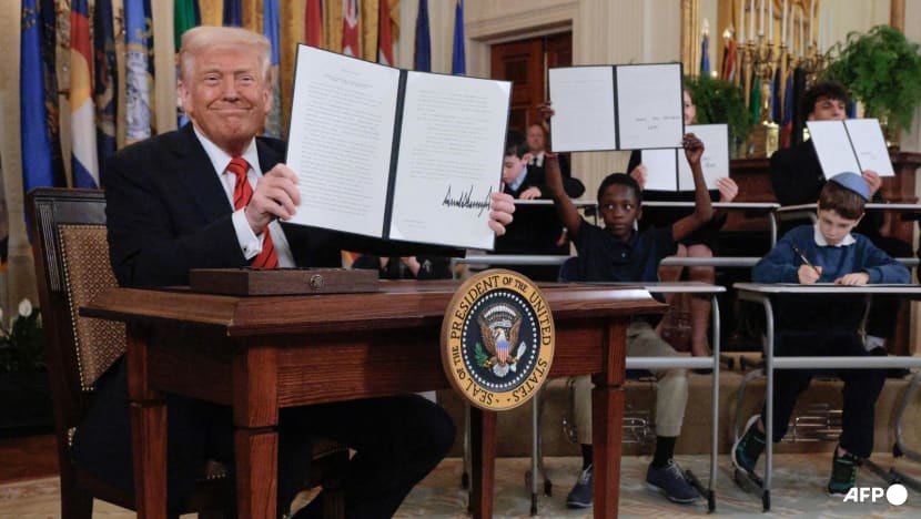 Trump signs order aimed at dismantling US Department of Education  