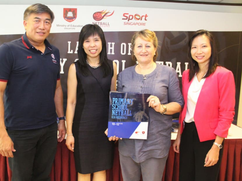 The Primary School Netball Co-Curricular ­Activity resource was launched by (from left) Sport Singapore CEO Lim Teck Yin, Netball Singapore president Jessica Tan, high-performance coach Julie Hoornweg and Ms Liew Wei Li, divisional director, Ministry of Education. Photo: Damien Teo