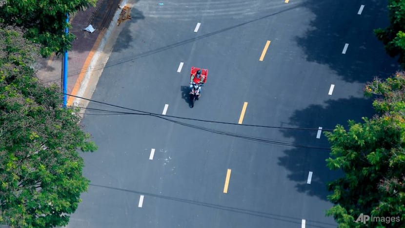 Vietnam puts southern region in lockdown as COVID-19 surge grows 