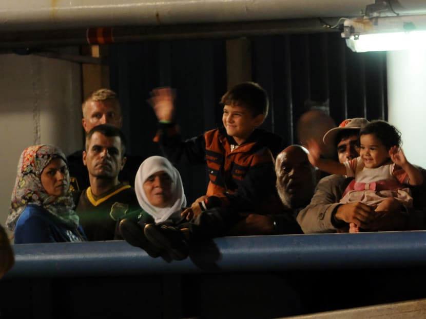 Refugees or migrants? Debate over words to describe crisis