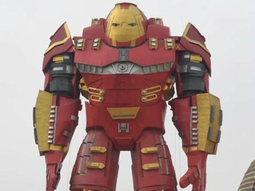 The new statue is painted in iconic red and yellow colours of Marvel Comics superhero Ironman, but its bulk bears more similarity to an Autobot from American film franchise Transformers. Photo: Animation Innovation Park in Chuzhou The new statue is painted in iconic red and yellow colours of Marvel Comics superhero Ironman, but its bulk bears more similarity to an Autobot from American film franchise Transformers. Photo: Animation Innovation Park in Chuzhou