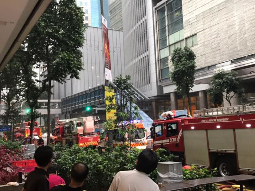 The Singapore Civil Defence Force was alerted at about 1pm to a fire incident at 3 Shenton Way on Feb 24, 2017. Photo: Evelyn Wu/Facebook
